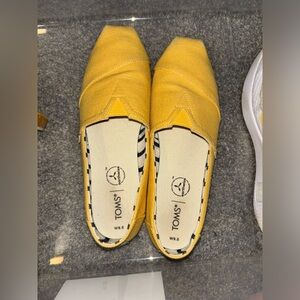 TOMS Yellow Slip-Ons